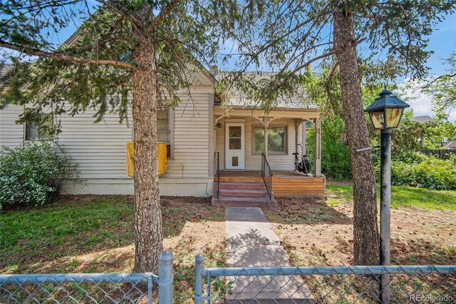 117 S Limit St, Colorado Springs, CO 80905 - view of front facade featuring covered porch