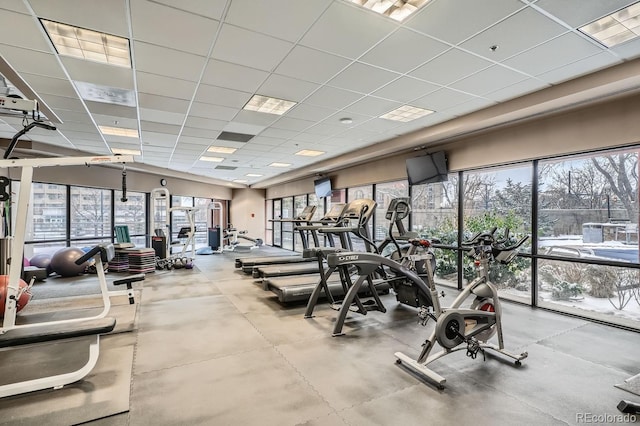 gym featuring a paneled ceiling