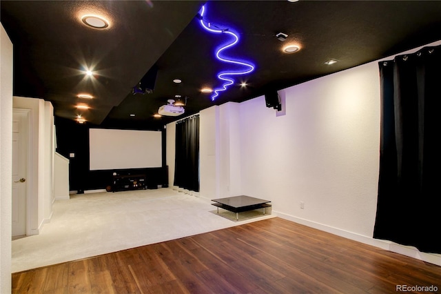 13921 Scarlet Sage Ln, Parker, CO 80134 - home theater featuring wood finished floors and baseboards