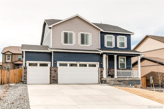 13921 Scarlet Sage Ln, Parker, CO 80134 - craftsman inspired home with covered porch, driveway, fence, a garage, and stone siding