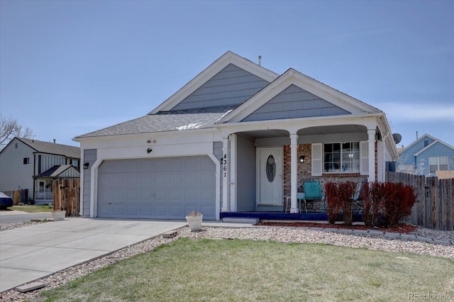 4361 Kirk Ct, Denver, CO 80249 - ranch-style home with fence, concrete driveway, an attached garage, a porch, and roof with shingles