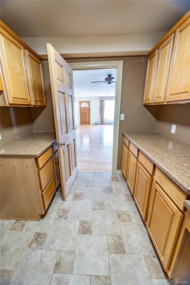 kitchen featuring light hardwood / wood-style flooring and ceiling fan