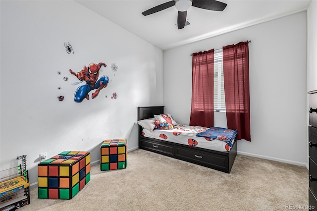 bedroom with ceiling fan and carpet flooring