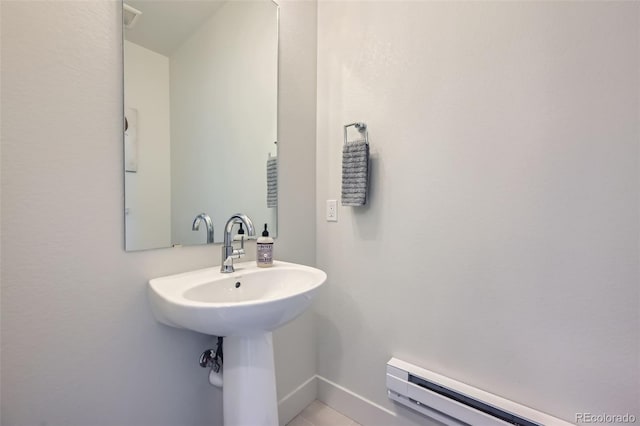 bathroom with baseboard heating