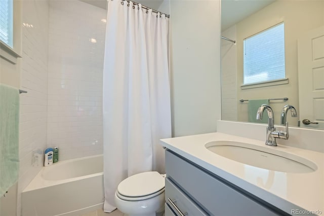 full bath featuring shower / bath combination with curtain, a wealth of natural light, vanity, and toilet