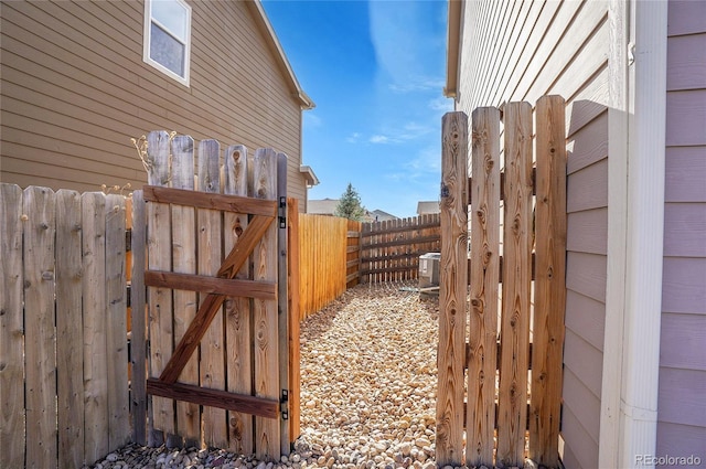 exterior space featuring fence and a gate