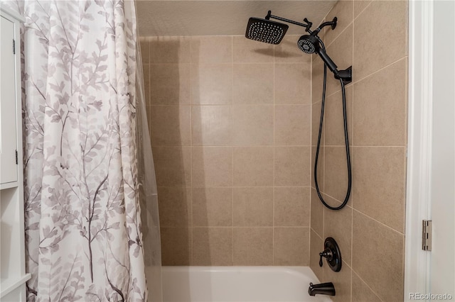 bathroom with shower / tub combo with curtain