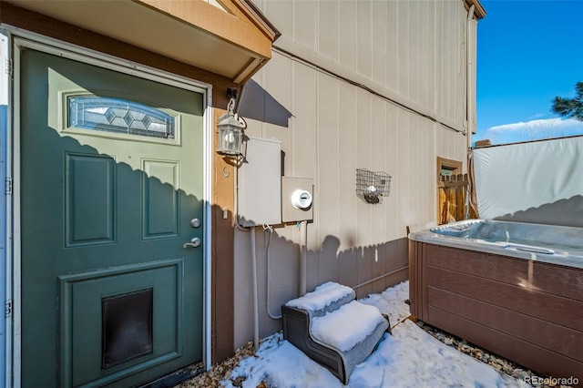 exterior space with a hot tub