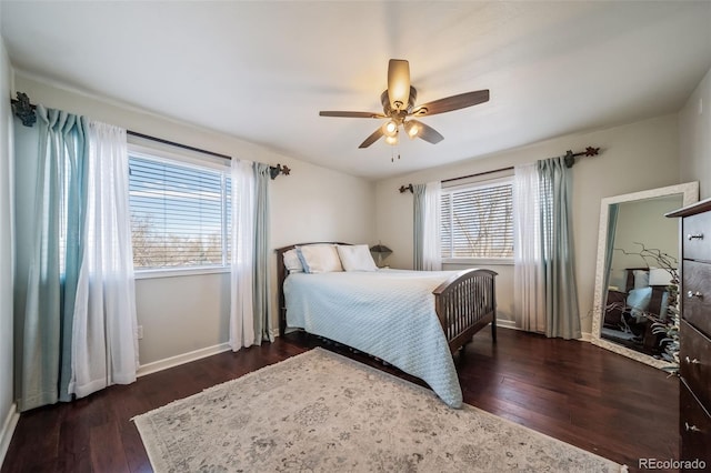 bedroom featuring dark hardwood / wood-style floors and ceiling fan