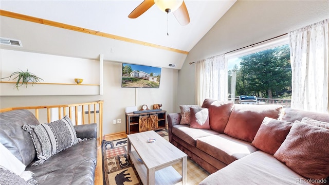 11348 Ranch Elsie Rd, Golden, CO 80403 - living area featuring vaulted ceiling, ceiling fan, visible vents, and wood finished floors