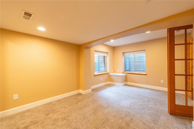 empty room featuring carpet floors