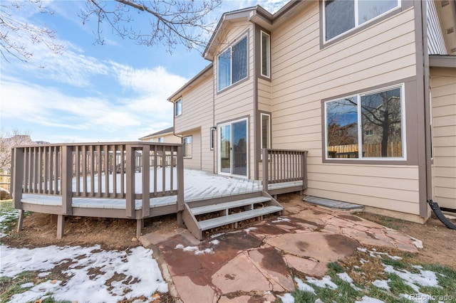 view of snow covered deck