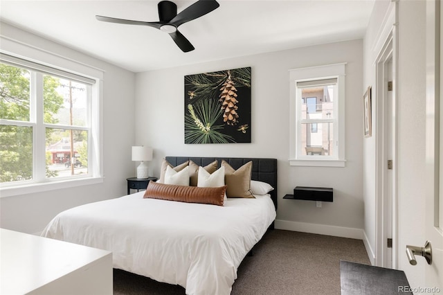 801 8th St, Golden, CO 80401 - bedroom featuring multiple windows, carpet flooring, baseboards, and ceiling fan