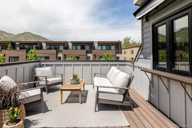 801 8th St, Golden, CO 80401 - wooden terrace with an outdoor living space and a mountain view