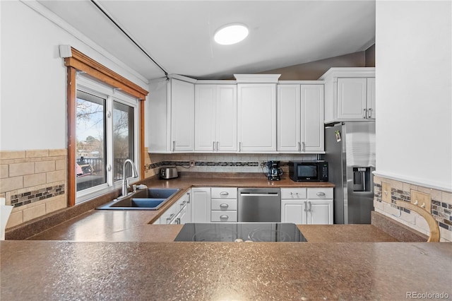 kitchen featuring white cabinetry, sink, decorative backsplash, and black appliances