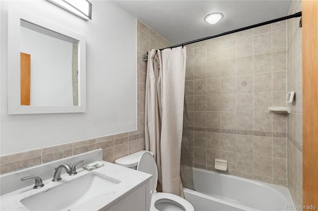 full bathroom with vanity, toilet, and shower / bath combo with shower curtain