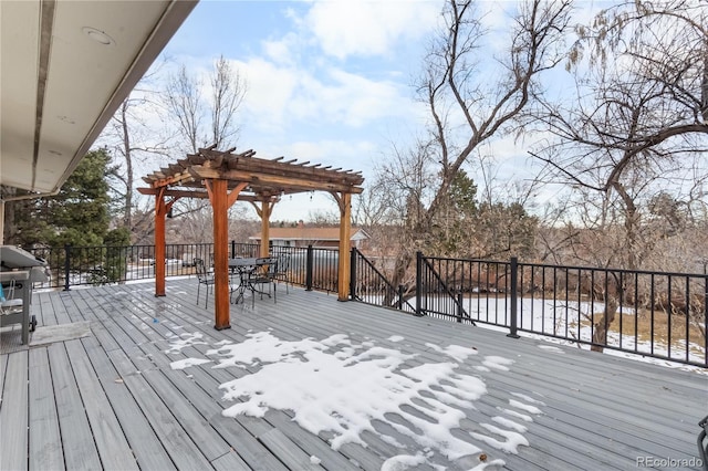 wooden deck with a pergola and grilling area