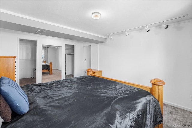 bedroom featuring carpet floors and a closet