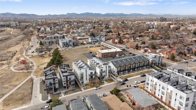 birds eye view of property with a residential view and a mountain view