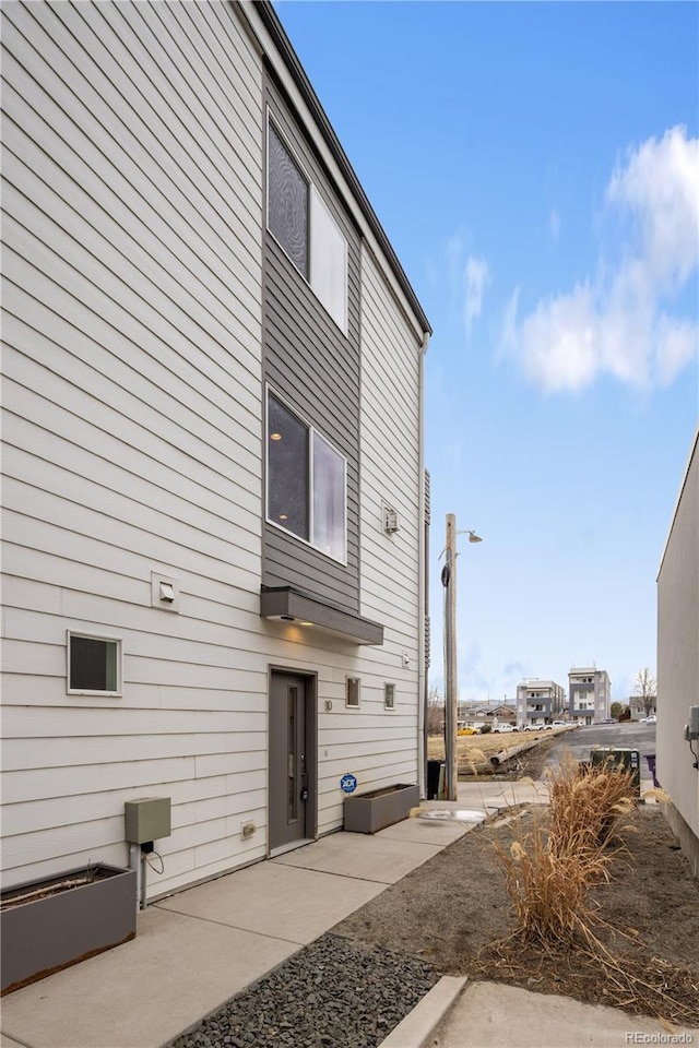 back of property featuring a patio