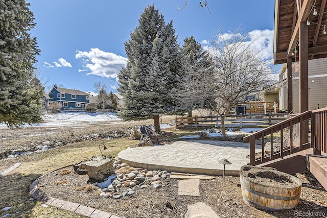 view of yard featuring a patio and fence