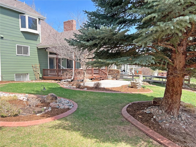 27 Buckthorn Dr, Littleton, CO 80127 - view of yard with a wooden deck