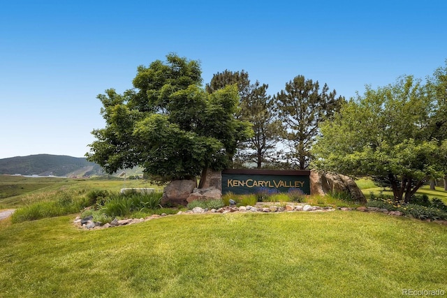 27 Buckthorn Dr, Littleton, CO 80127 - community sign with a yard and a mountain view