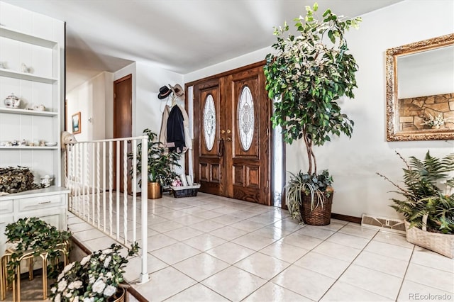 5300 Norwood Ave, Loveland, CO 80538 - foyer with light tile patterned floors