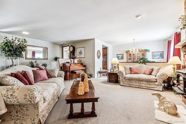 carpeted living room featuring an inviting chandelier