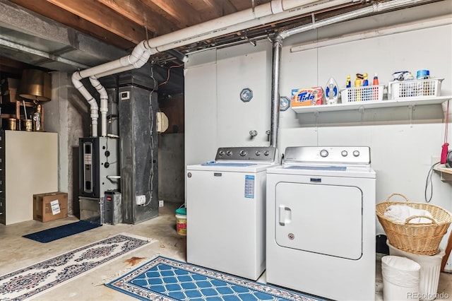 laundry room featuring washing machine and dryer