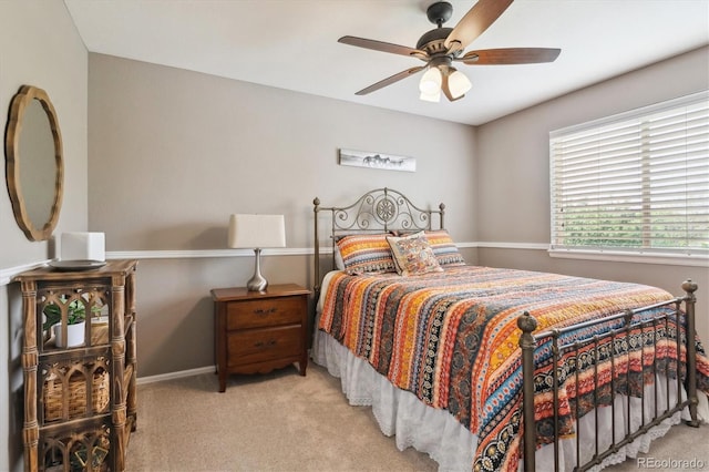 bedroom featuring carpet, ceiling fan, and baseboards