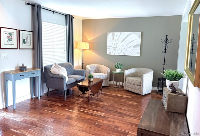 16662 W 61st Pl, Arvada, CO 80403 - living room featuring wood finished floors and baseboards