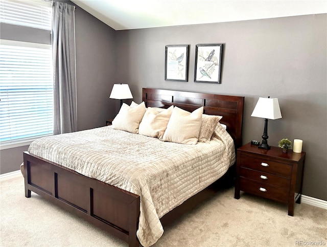 16662 W 61st Pl, Arvada, CO 80403 - bedroom featuring light carpet and baseboards