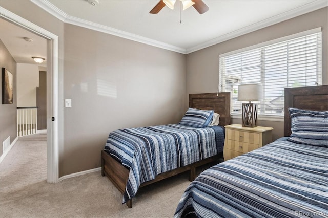 16662 W 61st Pl, Arvada, CO 80403 - bedroom featuring light carpet, ornamental molding, baseboards, and a ceiling fan