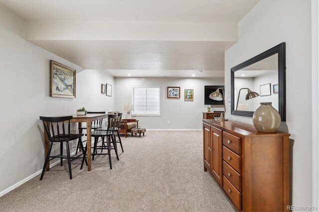 16662 W 61st Pl, Arvada, CO 80403 - dining area featuring light colored carpet and baseboards