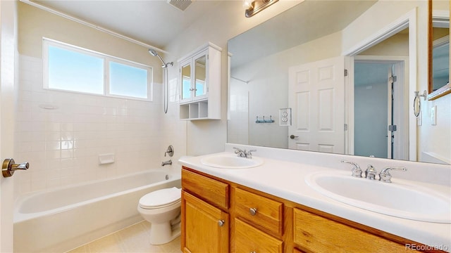 full bath featuring visible vents, a sink, toilet, and bathing tub / shower combination