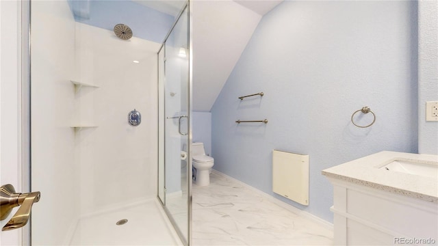 bathroom featuring vanity, toilet, marble finish floor, lofted ceiling, and a stall shower