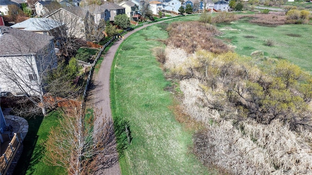 birds eye view of property with a residential view