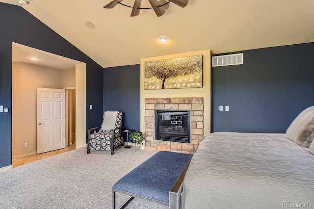 tiled bedroom with lofted ceiling, a fireplace, baseboards, recessed lighting, and carpet floors