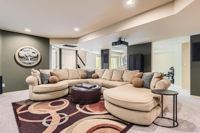 living area featuring light carpet, stairway, baseboards, and recessed lighting