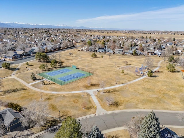 drone / aerial view featuring a residential view and a mountain view