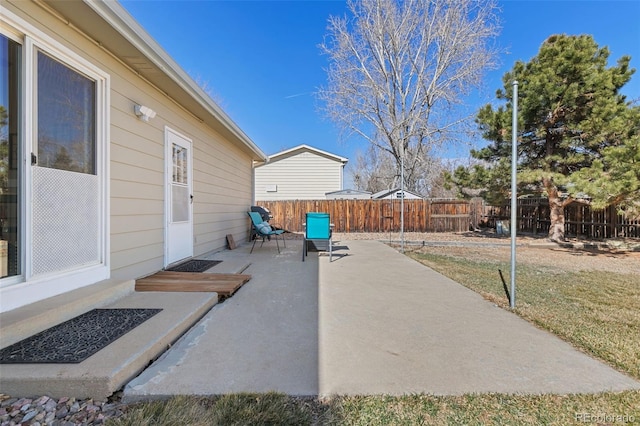 view of patio with fence