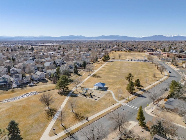 birds eye view of property featuring a residential view and a mountain view