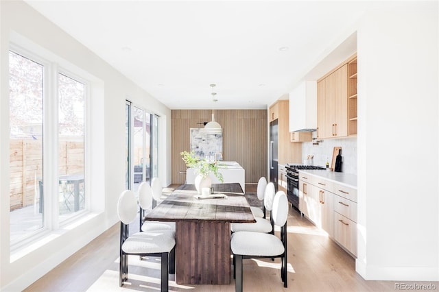 dining room with light wood-type flooring