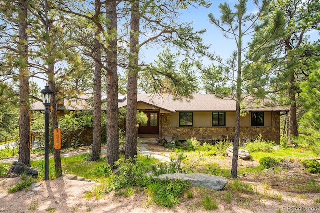 2907 Hiwan Dr, Evergreen, CO 80439 - view of front of property with stone siding and stucco siding