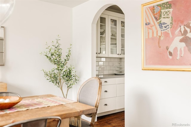 dining room with dark wood-style flooring