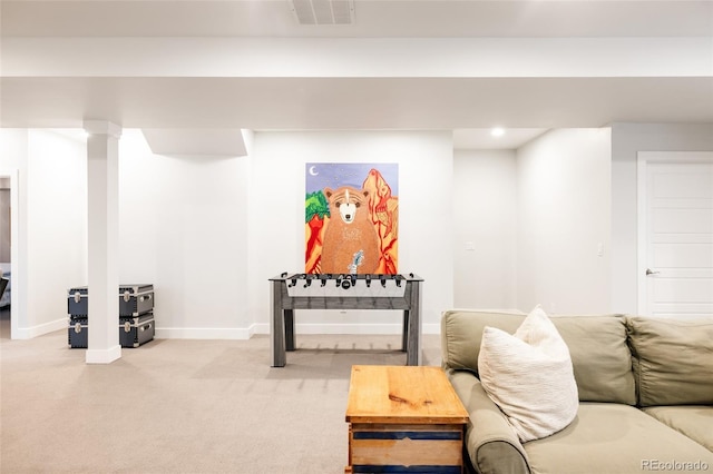 living area featuring recessed lighting, visible vents, baseboards, and light colored carpet