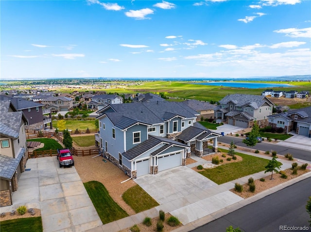9566 Poppy Way, Arvada, CO 80007 - aerial view of residential area featuring a large body of water