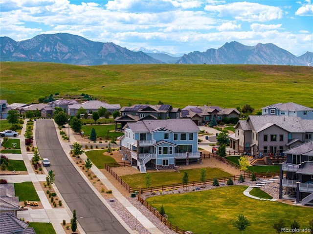 9566 Poppy Way, Arvada, CO 80007 - aerial perspective of suburban area featuring a mountain backdrop