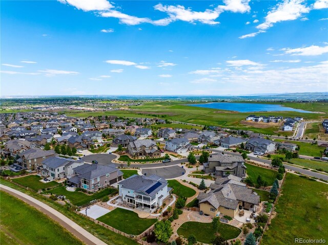 9566 Poppy Way, Arvada, CO 80007 - aerial perspective of suburban area featuring a large body of water